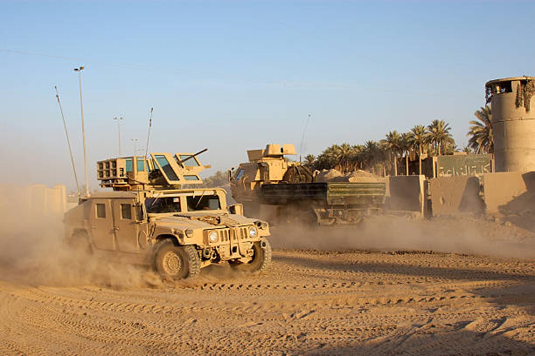 The soldiers stand on the tank with antenna system and military power supply device. - Grand-Tek